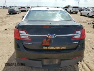 2014 Ford Police Interceptor with VIN 1FAHP2L81EG148870, listed as a Copart auction lot 73039214 with 255,800 mi miles and Salvage title. Bid and sale history available at DreamBid. Image 6.