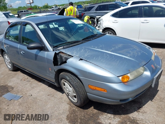 2002 Saturn SL z VIN 1G8ZK52732Z152274, wystawiony jako IAAI lot #42103737 z przebiegiem 56 781 mil mil oraz . Historia ofert i sprzedaży dostępna na DreamBid. Obrazek 1.