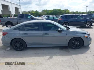 2025 Honda Civic Sport with VIN 2HGFE2F57SH571849, listed as a IAAI auction lot 41902538 with 869 mi miles and . Bid and sale history available at DreamBid. Image 13.