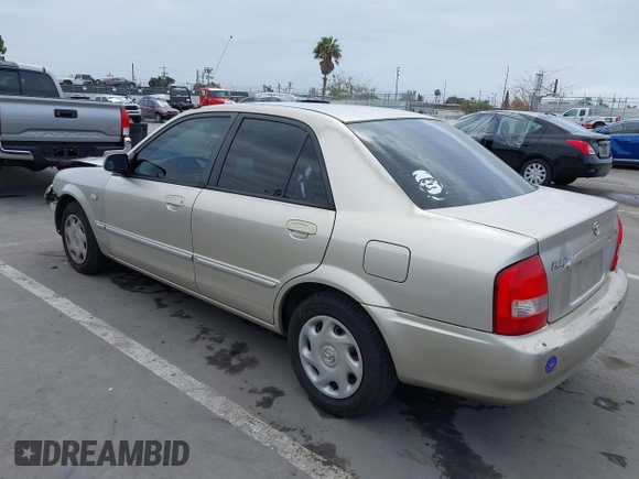 2002 Mazda Protege DX with VIN JM1BJ225121620394, listed as a IAAI auction lot 42043056 with 187,360 mi miles and . Bid and sale history available at DreamBid. Image 3.