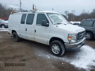 2011 Ford Econoline Cargo Commercial with VIN 1FTNE1EWXBDA35585, listed as a IAAI auction lot 41349320 with 122,311 mi miles. Bid and sale history available at carsss.com. Image 1.