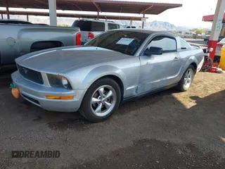 2007 Ford Mustang Deluxe with VIN 1ZVFT80N475199141, listed as a IAAI auction lot 41979242 with 243,967 mi miles and . Bid and sale history available at carsss.com. Image 2.