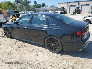 2016 Audi S6 Premium Plus z VIN WAUF2AFC2GN066099, wystawiony jako Copart lot #56342625 z przebiegiem 100 787 mil mil oraz Szkody całkowita. Historia ofert i sprzedaży dostępna na DreamBid. Obrazek 2.