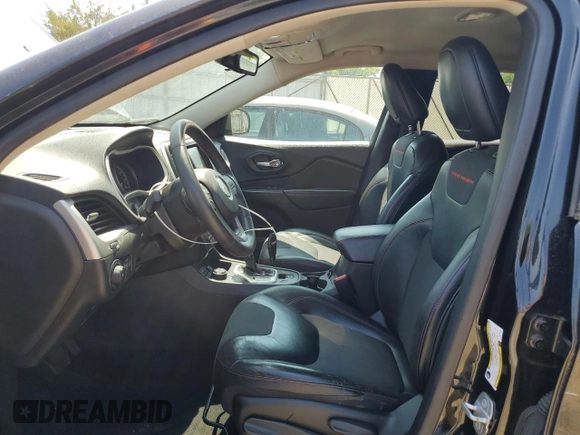 2015 Jeep Cherokee Trailhawk with VIN 1C4PJMBS6FW785891, listed as a Copart auction lot 61040565 with 156,421 mi miles and Clean title. Bid and sale history available at DreamBid. Image 7.