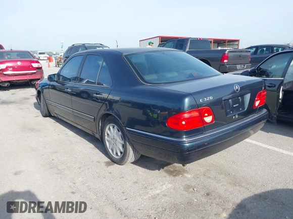 1997 Mercedes-Benz E-Class with VIN WDBJF55F7VJ027080, listed as a IAAI auction lot 42120838 with 150,197 mi miles. Bid and sale history available at carsss.com. Image 3.