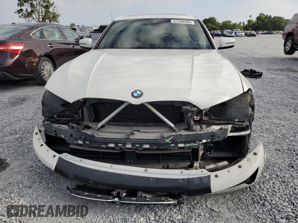 2020 BMW 3 Series 330i with VIN WBA5R1C0XLFH39262, listed as a Copart auction lot 57398585 with 55,456 mi miles and Salvage title. Bid and sale history available at DreamBid. Image 5.