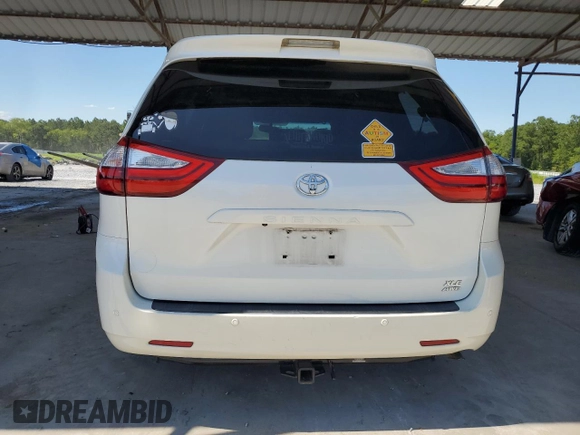 2015 Toyota Sienna Limited z VIN 5TDDK3DC7FS119915, wystawiony jako Copart lot #61974325 z przebiegiem 134 806 mil mil oraz Szkoda całkowita • Salvage title. Historia ofert i sprzedaży dostępna na DreamBid. Obrazek 6.
