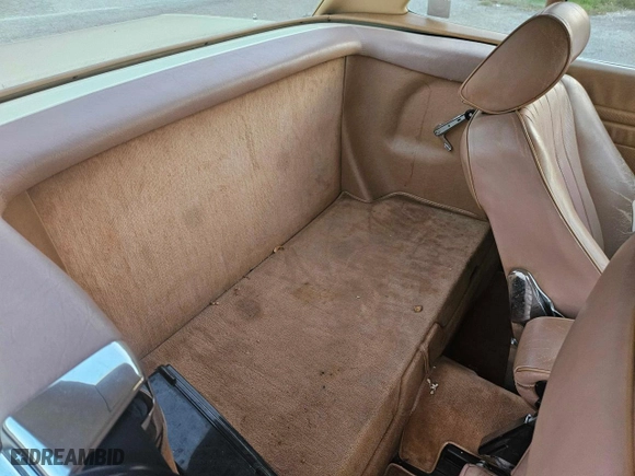 1987 Mercedes-Benz 560 Series 560SL with VIN WDBBA48D5HA061899, listed as a Copart auction lot 76554184 with NaN miles and Salvage Title. Bid and sale history available at carsss.com. Image 6.