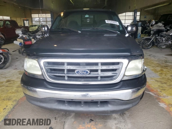 2002 Ford F-150 XL with VIN 1FTRF17W72NA55539, listed as a Copart auction lot 82529424 with 181,747 mi miles and Salvage Title. Bid and sale history available at carsss.com. Image 5.