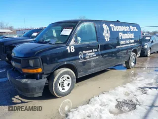 2017 Chevrolet Express Cargo Van with VIN 1GCWGBFF9H1112640, listed as a IAAI auction lot 41401549 with 157,773 mi miles. Bid and sale history available at carsss.com. Image 2.