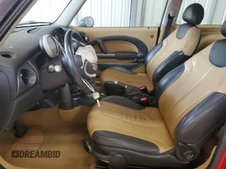 2004 MINI Hardtop with VIN WMWRC33474TJ58626, listed as a Copart auction lot 49226175 with 116,115 mi miles and Salvage Title. Bid and sale history available at DreamBid. Image 7.