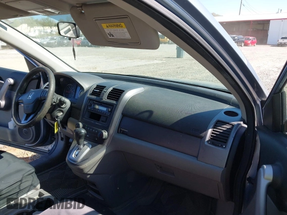 2007 Honda CR-V LX with VIN JHLRE38357C055256, listed as a IAAI auction lot 42050441 with 311,062 mi miles. Bid and sale history available at carsss.com. Image 5.