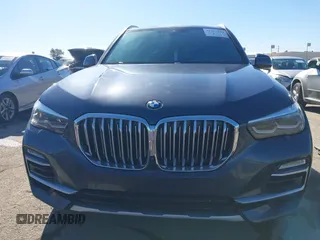 2021 BMW X5 sDrive40i with VIN 5UXCR4C08M9E15642, listed as a IAAI auction lot 41377524 with 76,050 mi miles. Bid and sale history available at carsss.com. Image 13.