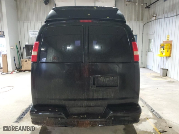 2006 GMC Savana Cargo Van YF7 Upfitter with VIN 1GDFH15T961127209, listed as a Copart auction lot 73216384 with 244,102 mi miles and Salvage Title. Bid and sale history available at carsss.com. Image 6.