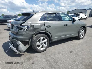 2021 Audi Q3 Premium with VIN WA1AUCF37M1067054, listed as a Copart auction lot 57299815 with 67,334 mi miles and Salvage title. Bid and sale history available at DreamBid. Image 3.