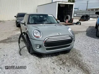 2014 MINI Hardtop with VIN WMWXM5C51ET934047, listed as a Copart auction lot 63039335 with 104,446 mi miles and Salvage title. Bid and sale history available at DreamBid. Image 15.