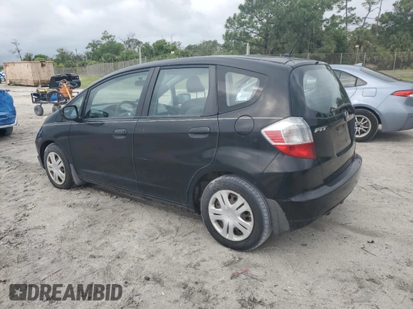 2009 Honda Fit with VIN JHMGE88249S068080, listed as a Copart auction lot 52469735 with 222,156 mi miles and Clean Title. Bid and sale history available at carsss.com. Image 2.