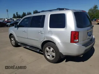 2009 Honda Pilot EX-L with VIN 5FNYF48549B009985, listed as a Copart auction lot 55786845 with 118,682 mi miles and Salvage title. Bid and sale history available at DreamBid. Image 2.