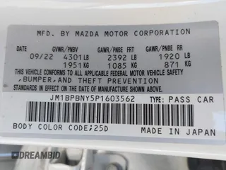 2023 Mazda 3 Premium Plus with VIN JM1BPBNY5P1603562, listed as a IAAI auction lot 42160455 with 24,271 mi miles and . Bid and sale history available at DreamBid. Image 9.