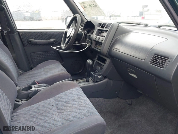 1998 Toyota RAV4 with VIN JT3GP10V9W7032820, listed as a IAAI auction lot 42046186 with 312,888 mi miles. Bid and sale history available at carsss.com. Image 5.