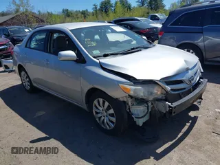 2012 Toyota Corolla L with VIN 2T1BU4EEXCC818354, listed as a IAAI auction lot 42129695 with 216,307 mi miles. Bid and sale history available at carsss.com. Image 1.