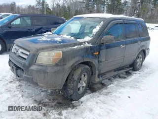 2007 Honda Pilot EX-L with VIN 2HKYF185X7H520209, listed as a IAAI auction lot 41484225 with 212,109 mi miles. Bid and sale history available at carsss.com. Image 2.