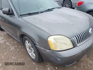2006 Mercury Montego Luxury z VIN 1MEFM40166G617559, wystawiony jako IAAI lot #41768007 z przebiegiem 234 542 mil mil oraz . Historia ofert i sprzedaży dostępna na DreamBid. Obrazek 6.