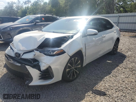 2019 Toyota Corolla L with VIN 5YFBURHE5KP921284, listed as a Copart auction lot 54277235 with 100,935 mi miles and Salvage Title. Bid and sale history available at DreamBid. Image 1.