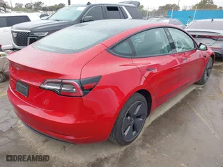 2023 Tesla Model 3 with VIN 5YJ3E1EA2PF476140, listed as a IAAI auction lot 41789189 with 33,435 mi miles. Bid and sale history available at carsss.com. Image 4.