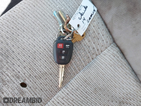 2014 Toyota Camry L with VIN 4T4BF1FK9ER408973, listed as a IAAI auction lot 42074491 with 183,934 mi miles and . Bid and sale history available at DreamBid. Image 11.