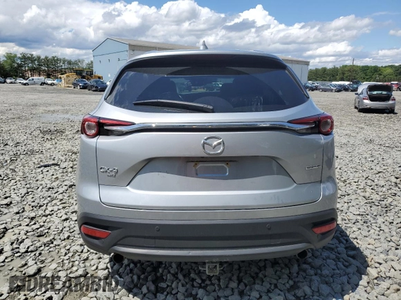 2022 Mazda CX-9 Touring z VIN JM3TCBCY6N0618360, wystawiony jako Copart lot #58356635 z przebiegiem 36 606 mil mil oraz Szkoda całkowita • Salvage title. Historia ofert i sprzedaży dostępna na DreamBid. Obrazek 6.