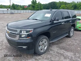 2017 Chevrolet Tahoe LT with VIN 1GNSCBKCXHR342170, listed as a IAAI auction lot 42137766 with 76,854 mi miles and . Bid and sale history available at DreamBid. Image 2.