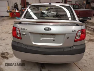 2009 Kia Rio LX with VIN KNADE223596444133, listed as a IAAI auction lot 41598865 with Not Provided miles and . Bid and sale history available at DreamBid. Image 16.