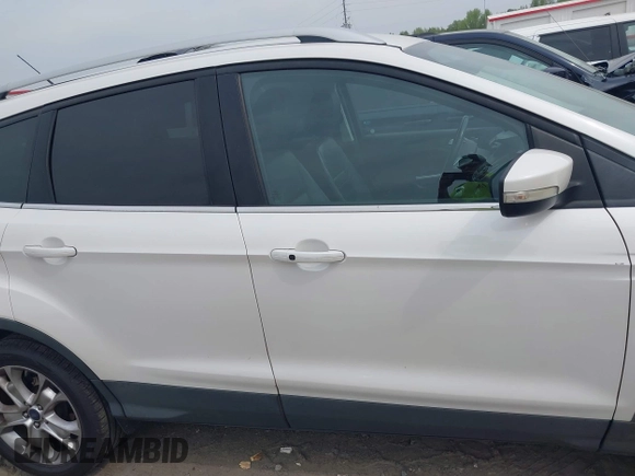 2016 Ford Escape Titanium with VIN 1FMCU9JX6GUB50226, listed as a IAAI auction lot 42033033 with 108,782 mi miles and . Bid and sale history available at DreamBid. Image 13.