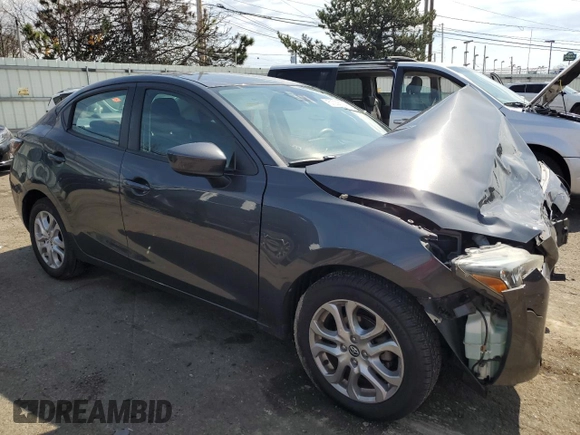 2018 Toyota Yaris with VIN 3MYDLBYV1JY318108, listed as a Copart auction lot 51038825 with 75,816 mi miles and Salvage Title. Bid and sale history available at DreamBid. Image 4.