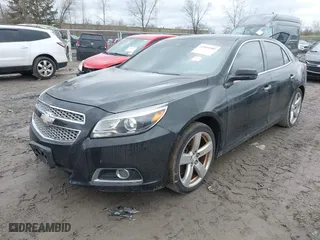 2013 Chevrolet Malibu LTZ with VIN 1G11J5SX6DF229593, listed as a IAAI auction lot 42016580 with 166,365 mi miles. Bid and sale history available at carsss.com. Image 2.