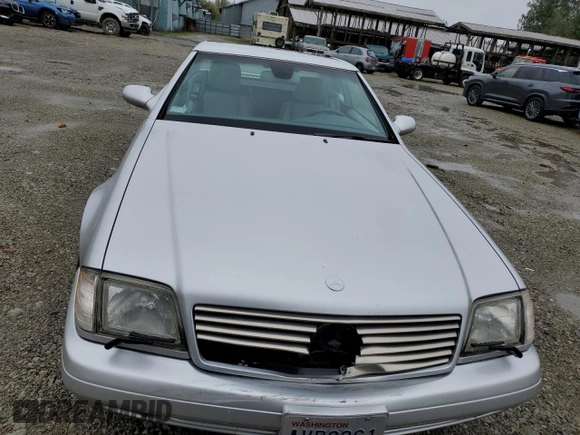 2001 Mercedes-Benz SL 500 with VIN WDBFA68F01F198112, listed as a Copart auction lot 77034114 with 114,049 mi miles and Salvage title. Bid and sale history available at DreamBid. Image 5.