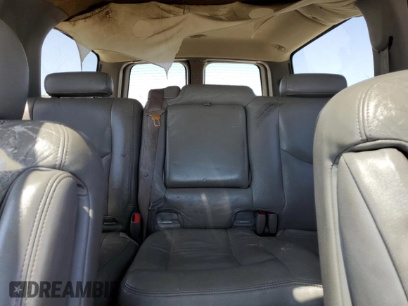 2003 Chevrolet Suburban Z71 z VIN 1GNFK16T83J249213, wystawiony jako Copart lot #58622085 z przebiegiem 239 586 mil mil oraz Czysty tytuł • Clean title. Historia ofert i sprzedaży dostępna na DreamBid. Obrazek 10.
