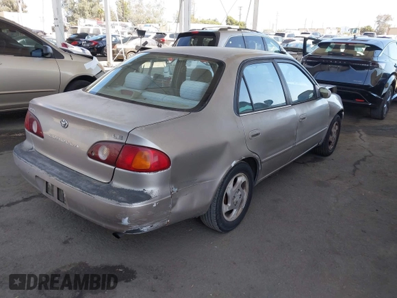 2002 Toyota Corolla CE with VIN 1NXBR12E82Z624794, listed as a IAAI auction lot 42571532 with 122,749 mi miles and . Bid and sale history available at DreamBid. Image 4.