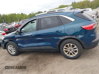 2020 Ford Escape SE z VIN 1FMCU9G66LUC32126, wystawiony jako IAAI lot #42313650 z przebiegiem 104 550 mil mil oraz . Historia ofert i sprzedaży dostępna na DreamBid. Obrazek 14.