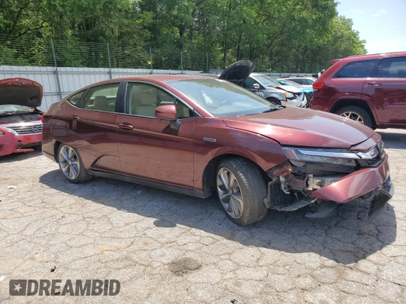 2018 Honda Clarity Touring z VIN JHMZC5F38JC000291, wystawiony jako Copart lot #57334545 z przebiegiem 84 439 mil mil oraz Szkoda całkowita • Salvage title. Historia ofert i sprzedaży dostępna na DreamBid. Obrazek 4.