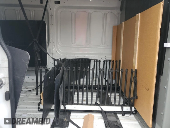 2023 Ford Transit Cargo с VIN 1FTBR2C80PKB31083, выставлен на аукционе Copart как лот 50551005 с пробегом 54 390 миль миль и Списание • Salvage title. История ставок и продаж доступна на DreamBid. Изображение 11.