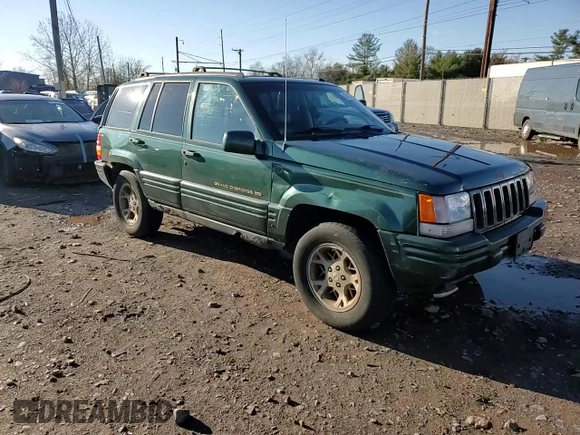 1997 Jeep Grand Cherokee Limited with VIN 1J4GZ78Y2VC728605, listed as a Copart auction lot 83342804 with 104,185 mi miles and Salvage Title. Bid and sale history available at carsss.com. Image 12.