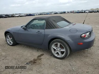 2007 Mazda MX-5 Miata Sport z VIN JM1NC25F970134960, wystawiony jako Copart lot #48422265 z przebiegiem 149 357 mil mil oraz Czysty tytuł • Clean title. Historia ofert i sprzedaży dostępna na DreamBid. Obrazek 2.