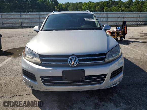 2014 Volkswagen Touareg Lux with VIN WVGEF9BP1ED012267, listed as a Copart auction lot 58924055 with 81,009 mi miles and Salvage title. Bid and sale history available at DreamBid. Image 5.