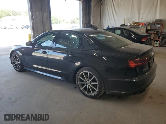 2016 Audi A6 Prestige with VIN WAUHGAFC2GN001442, listed as a Copart auction lot 61633805 with 128,140 mi miles and Salvage title. Bid and sale history available at DreamBid. Image 2.