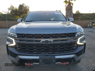 2021 Chevrolet Suburban Z71 with VIN 1GNSKDKDXMR310076, listed as a Copart auction lot 43055185 with 88,300 mi miles and Salvage title. Bid and sale history available at DreamBid. Image 5.