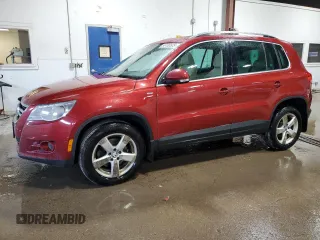 2010 Volkswagen Tiguan S with VIN WVGAV7AX8AW003815, listed as a Copart auction lot 56180605 with 149,047 mi miles and Clean title. Bid and sale history available at DreamBid. Image 1.