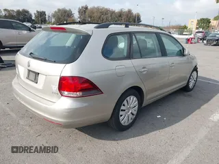 2013 Volkswagen Jetta SportWagen S with VIN 3VWPP7AJ9DM643540, listed as a IAAI auction lot 41911740 with 124,914 mi miles. Bid and sale history available at carsss.com. Image 4.