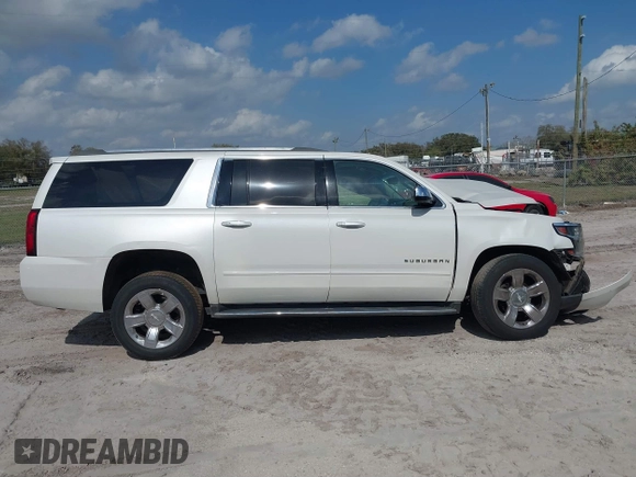 2017 Chevrolet Suburban Premier with VIN 1GNSKJKC0HR288648, listed as a IAAI auction lot 41579677 with Not Provided miles and . Bid and sale history available at DreamBid. Image 12.